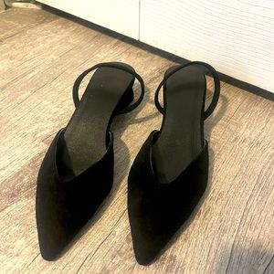 Black sling back mules